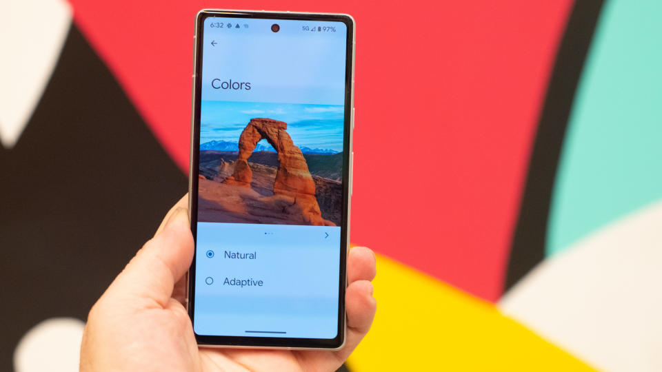 Google Pixel 7a phone showing screens camera and Android 13