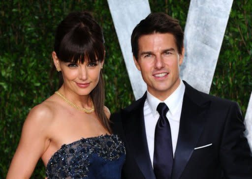 Katie Holmes and Tom Cruise arrive at the Vanity Fair Oscar Party in Hollywood on February 26. Cruise now faces a court battle for custody of the couple's six-year-old daughter Suri, after reports that Holmes is seeking sole custody because she fears Cruise wants to draw the child deeper into Scientology