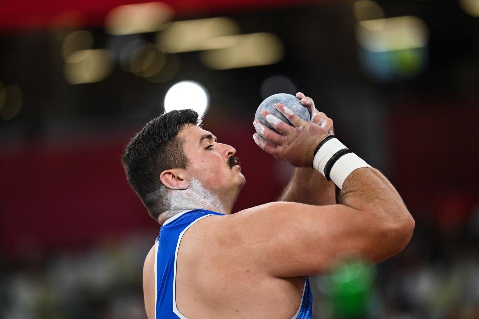 <p>Italy's Nicholas James Ponzio competes in the men's shot put qualification during the Tokyo 2020 Olympic Games at the Olympic Stadium in Tokyo on August 3, 2021. (Photo by Andrej ISAKOVIC / AFP) (Photo by ANDREJ ISAKOVIC/AFP via Getty Images)</p> 