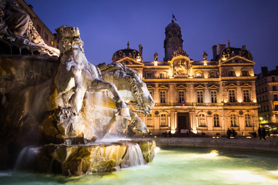 3) The Bartholdi Fountain and City Hall of Lyon at night