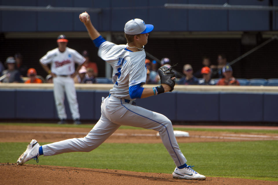Duke starting pitcher Andrew Healy throws during the first inning of a NCAA college baseball super regional game against Virginia, Friday, June 9, 2023, in Charlottesville, Va. (AP Photo/John C. Clark)