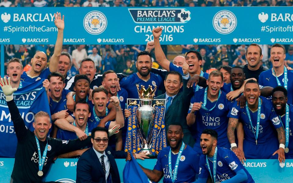 Leicester with the Premier League trophy - AFP/Adrian Dennis