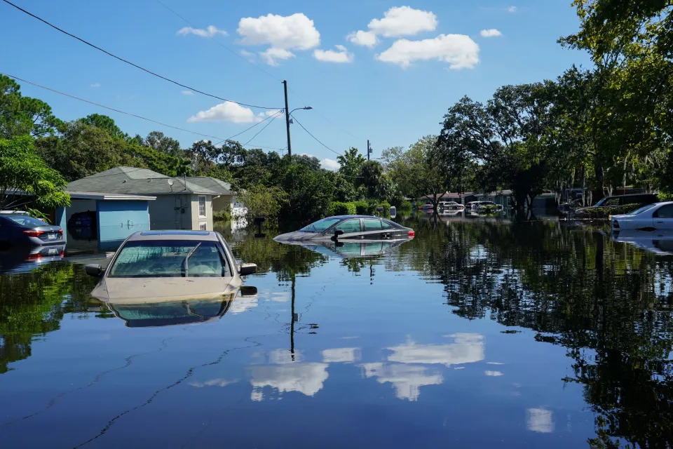 Flooding submerged several cars in an Orlando neighborhood.