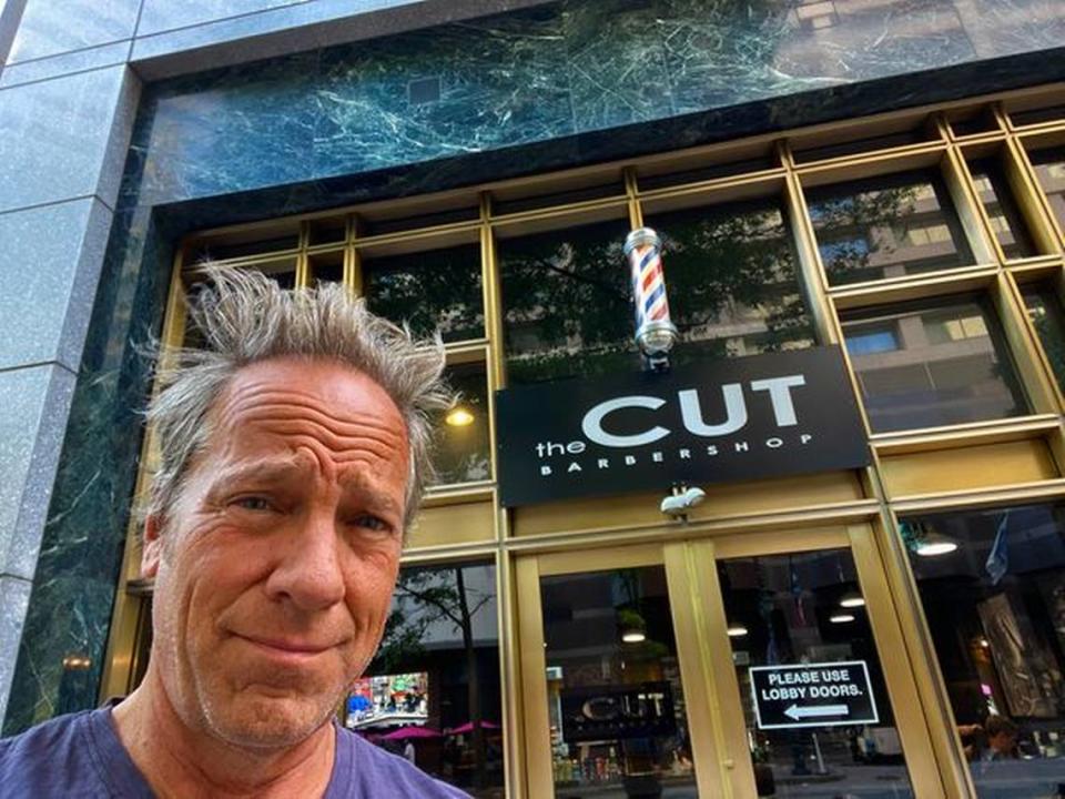 “Dirty Jobs” host Mike Rowe’s hair was all over the place before he entered The CUT Barbershop in uptown Charlotte on Friday, May 20, 2022.