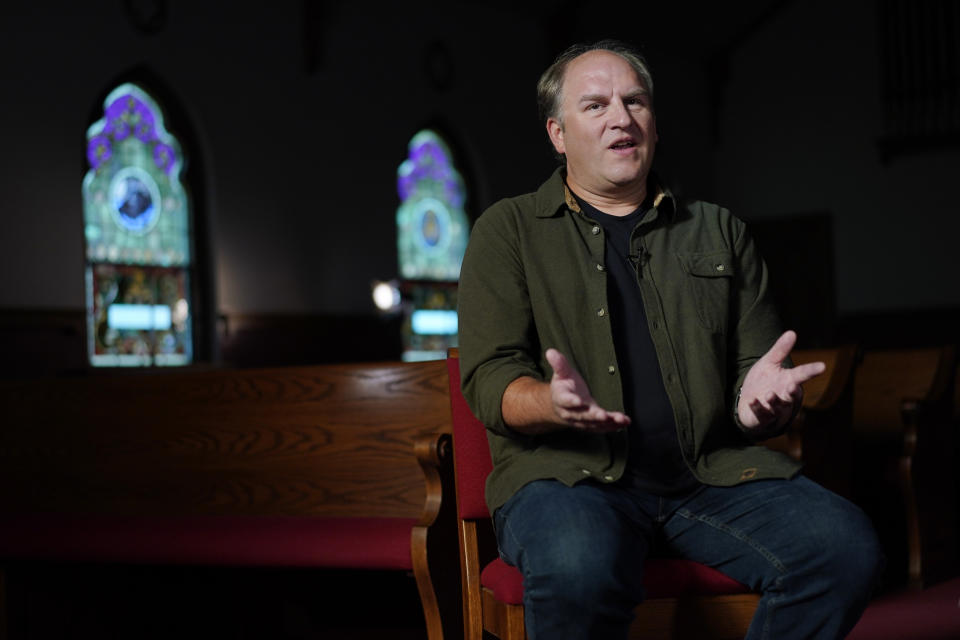 FILE - Gerald Groff, a former postal worker whose case will be argued before the Supreme Court, speaks during a television interview with the Associated Press at a chapel at the Hilton DoubleTree Resort in Lancaster, Pa., Wednesday, March 8, 2023. The Supreme Court on Thursday, June 29, used the case of a Christian mailman who didn't want to work Sundays to solidify protections for workers who are religious. In a unanimous decision the justices made clear that workers who ask for religious accommodations, such as taking the Sabbath off, should get them unless their employers show doing so would result in “substantial increased costs” to the business. (AP Photo/Carolyn Kaster, File)