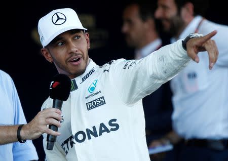 Formula One - F1 - Azerbaijan Grand Prix - Baku, Azerbaijan - June 24, 2017. Mercedes' Lewis Hamilton of Britain reacts after the qualifying session. REUTERS/David Mdzinarishvili