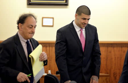 Defense Attorney James Sultan and Former New England Patriots football player Aaron Hernandez appear in the court room of the Bristol County Superior Court House in Fall River, Massachusetts, in front of the jury before they begin their deliberations, April 8, 2015. REUTERS/Faith Ninivaggi - RTR4WIPN