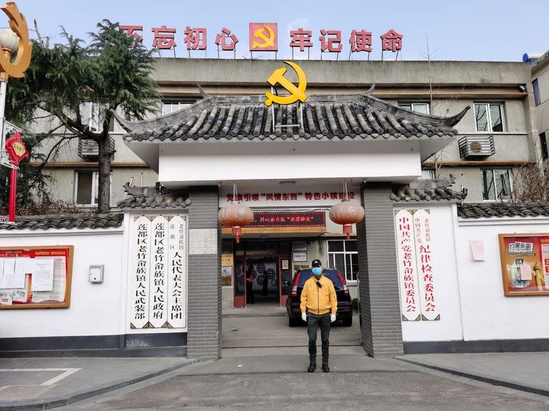 A handout photo shows a businessman Luca Zhou, 56, wearing a face mask on the streets of Prato