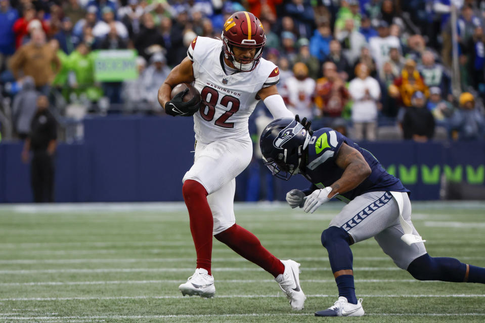 Washington Commanders tight end <a class="link " href="https://sports.yahoo.com/nfl/players/27648" data-i13n="sec:content-canvas;subsec:anchor_text;elm:context_link" data-ylk="slk:Logan Thomas;sec:content-canvas;subsec:anchor_text;elm:context_link;itc:0">Logan Thomas</a> (82) runs for yards after the catch against Seattle Seahawks safety <a class="link " href="https://sports.yahoo.com/nfl/players/28588" data-i13n="sec:content-canvas;subsec:anchor_text;elm:context_link" data-ylk="slk:Quandre Diggs;sec:content-canvas;subsec:anchor_text;elm:context_link;itc:0">Quandre Diggs</a> (6). Mandatory Credit: Joe Nicholson-USA TODAY Sports