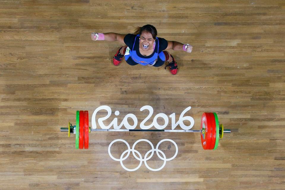 <p>Leidy Yessenia Solis Arboleda of Colombia reacts after lifting during the Women’s 69kg Group A weightlifting contest on Day 5 of the Rio 2016 Olympic Games at Riocentro – Pavilion 2 on August 10, 2016 in Rio de Janeiro, Brazil. (Photo by Stoyan Nenov/ Pool – Getty Images) </p>