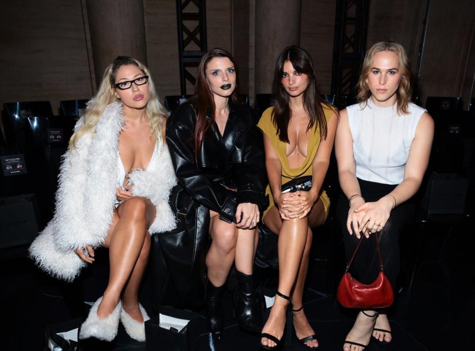 Julia Fox, Emily Ratajkowski, and Tommy Dorfman attend the PrettyLittleThing x Naomi Campbell runway show (Dimitrios Kambouris / Getty Images)