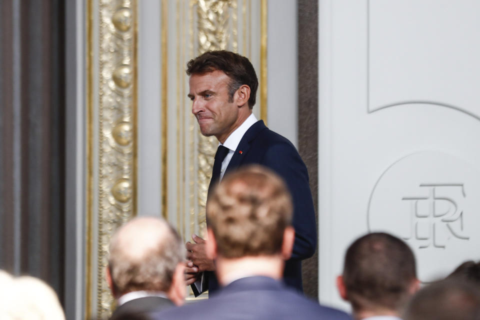 French President Emmanuel Macron arrives to deliver a speech during the French ambassadors' conference at the Elysee Palace in Paris, Thursday, Sept.1, 2022. French President Emmanuel Macron vowed to maintain France's humanitarian, economic and military support to Ukraine and strengthen Europe's unity to put pressure on Russia and prevent it from winning the war it is waging in Ukraine. (Mohammed Badra, Pool via AP)