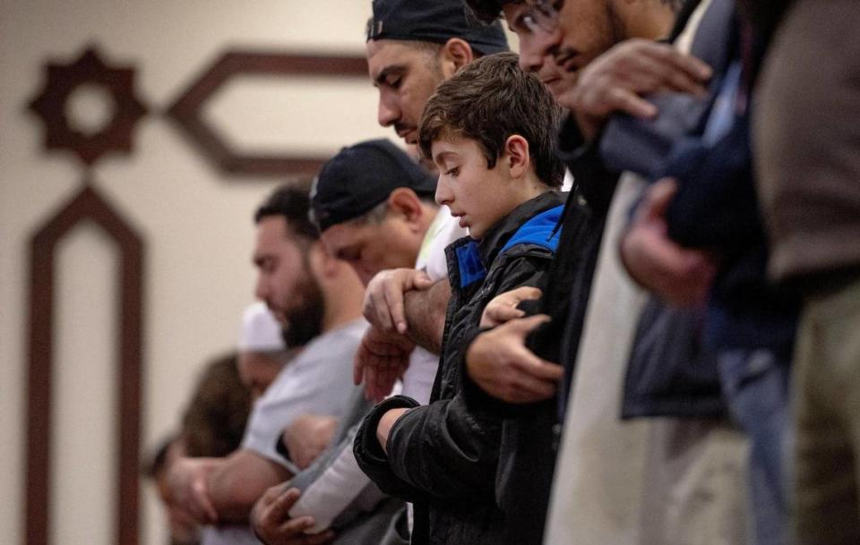 Muslims pray during the Islamic night prayer known as Isha for Ramadan at the Islamic Society of Greater Kansas City on Monday, April 10, 2023, in Kansas City.