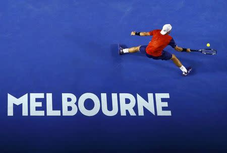 Australia's Lleyton Hewitt stretches for a shot during his second round match against Spain's David Ferrer at the Australian Open tennis tournament at Melbourne Park, Australia, January 21, 2016. REUTERS/Jason O'Brien