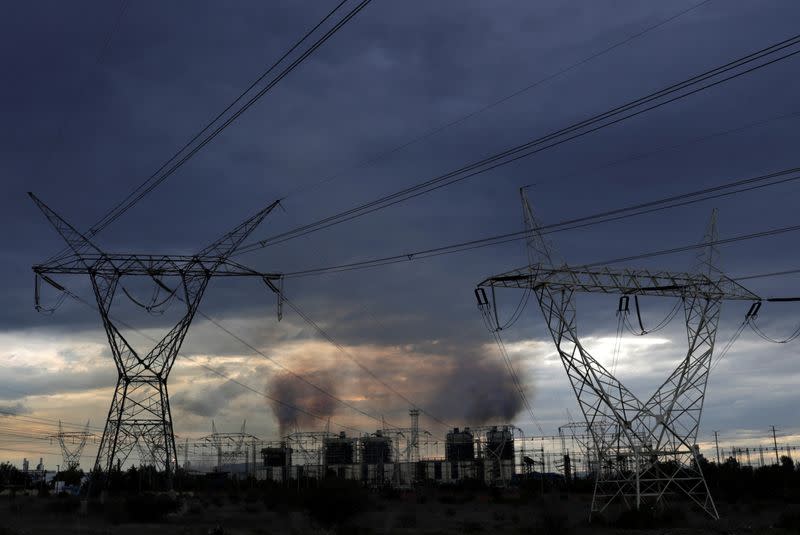 A steady stream of smoke spews out from the five exhaust chimneys belonging to the Tula power plant run by state-owned power company Commission Federal de Electricidad, or CFE, in Tula de Allende