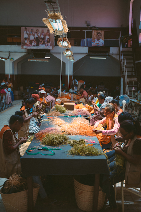 Artisans at work at the Made For A Woman atelier in Madagascar.