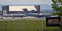 <p>Military aircraft sit on the tarmac at the Stewart Air National Guard Base in Newburgh, N.Y., Tuesday July 11, 2017. (Photo: Bebeto Matthews/AP) </p>