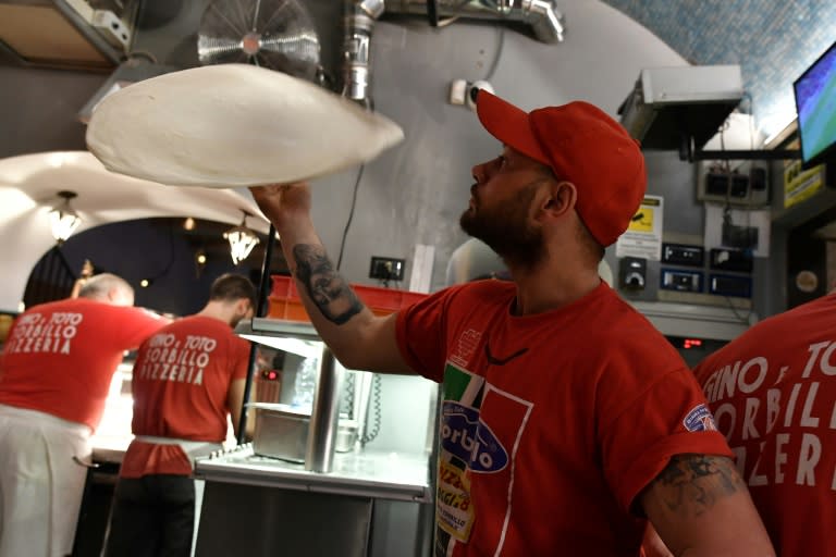 The art of making pizza originates in Naples