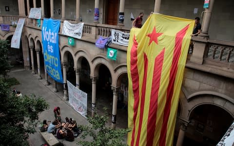 A giant Catalan separatist flag at the University of Barcelona - Credit: Reuters