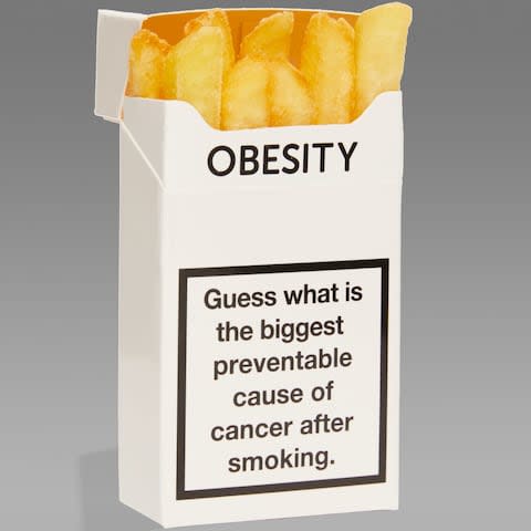 cigarette packet labelled obesiyt  - Credit: Simon Way
