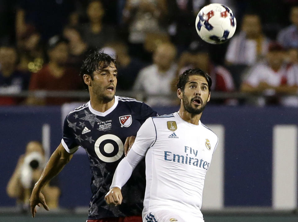 Real Madrid’s Isco, right, battles Orlando City’s Kaka during the MLS All-Star Game on Wednesday in Chicago. (AP)