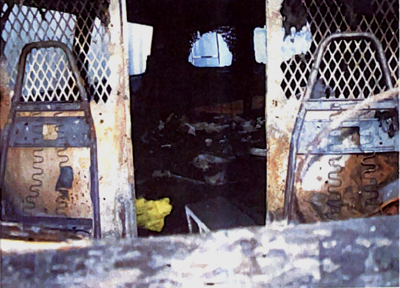 Fire damages are seen inside the van. (Image via San Mateo County Superior Court records)