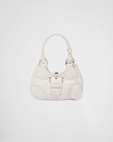 <p><a href="https://www.prada.com/us/en/p/prada-moon-padded-nappa-leather-bag/1BA381_2DYI_F0009_V_OOM" data-component="link" data-source="inlineLink" data-type="externalLink" data-ordinal="1" rel="nofollow">Prada</a></p>