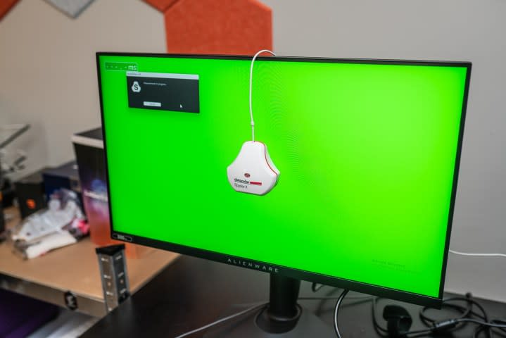 SpyderX strapped onto the Alienware 500Hz gaming monitor.