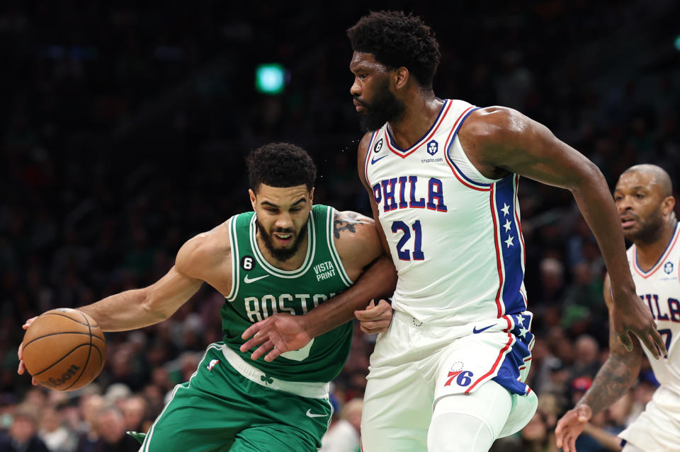 Jayson Tatum (left) struggled against Joel Embiid (right) and 76ers, but it didn't matter in a Celtics Game 2 blowout. (Maddie Meyer/Getty Images)