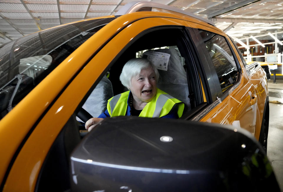 U.S. Treasury Secretary Janet Yellen sits inside a newly build vehicle during her tour at the Ford Assembling Plant in Pretoria, South Africa, Thursday, Jan. 26, 2023. (AP Photo/Themba Hadebe)