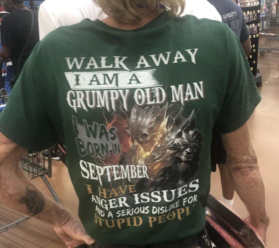 back of shirt reads, i'm a grumpy old man i was born in september, i have anger issues and a serious dislike for stupid people