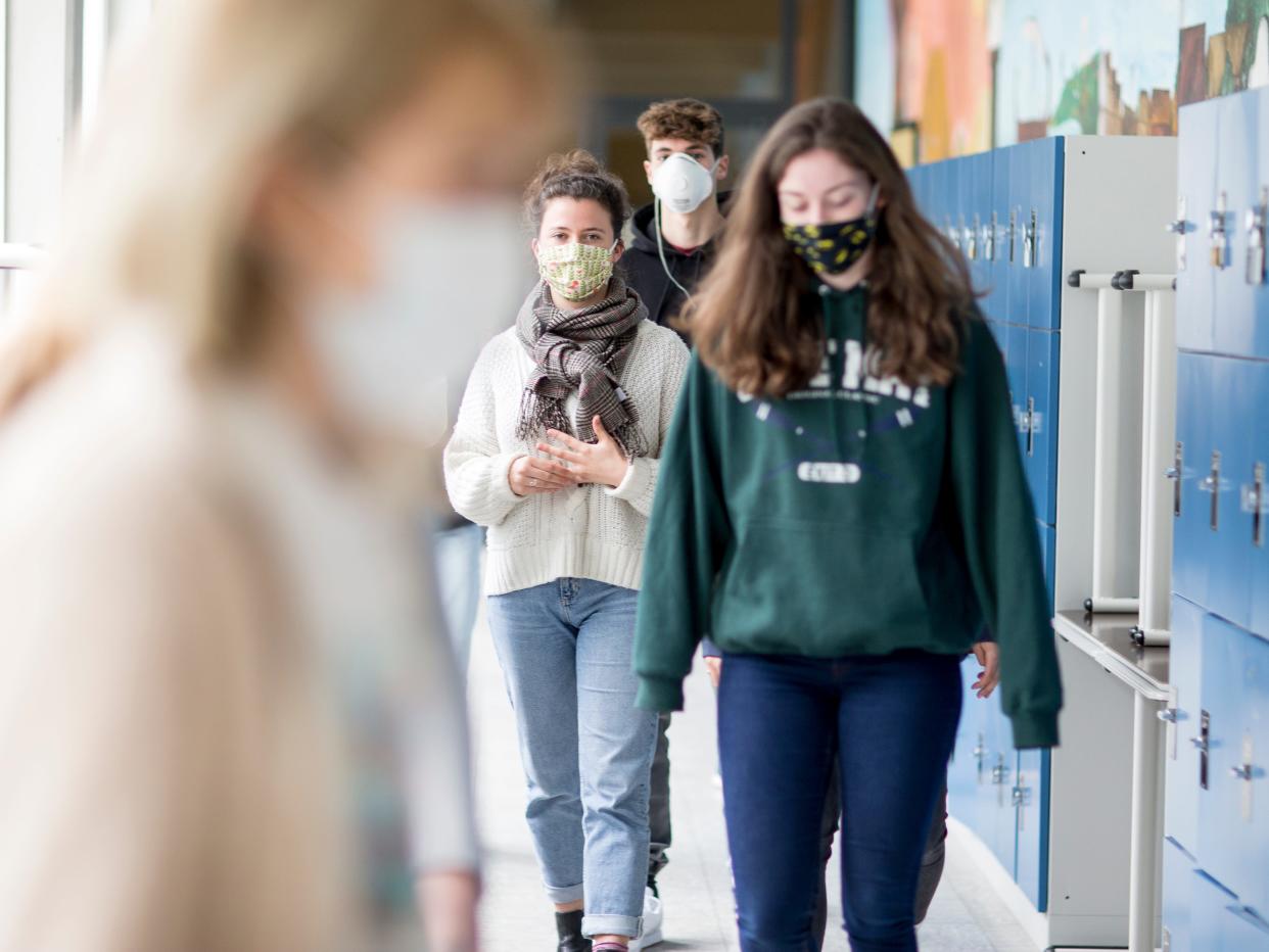 Students wearing masks at school.