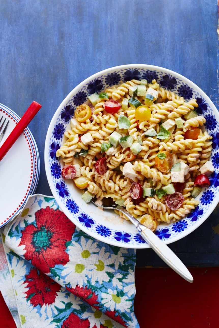 chipotle pasta salad in blue and white bowl