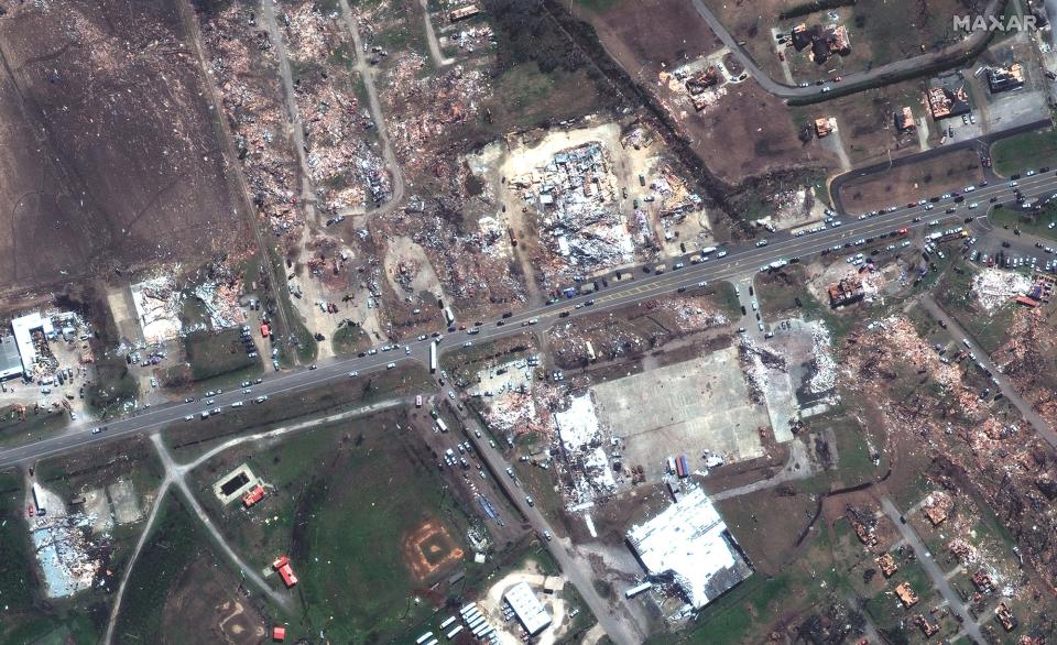 This satellite image provided by Maxar Technologies shows businesses and homes near Blues Highway in Rolling Fork, Miss. on March. 26, 2023 after a tornado struck overnight on Friday, March 24, 2023.