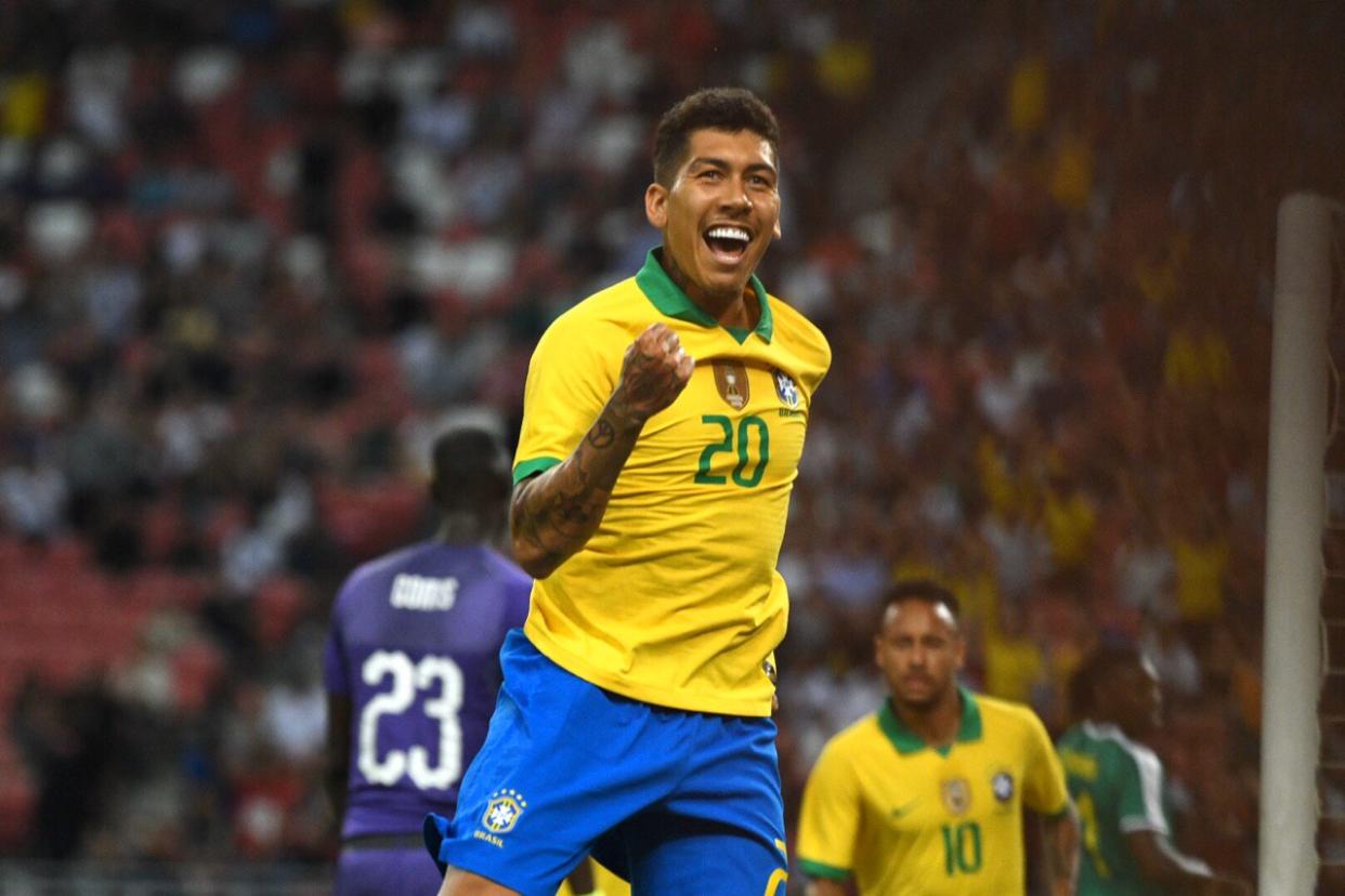 Brazil forward Roberto Firmino celebrates scoring against Senegal in their international friendly at the National Stadium (PHOTO: Stefanus Ian/Yahoo News Singapore)