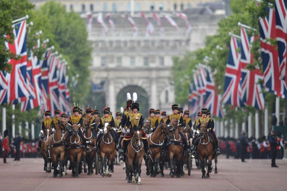 Members of the King's Troop Royal Artillery lead the parade down the Mall back to Buckingham Palace after the queen's birthday parade.