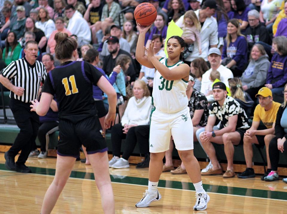 Brielle Bailey fires in a pass to a teammate in regional finals action on Wednesday.