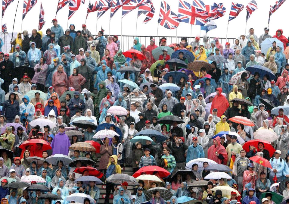 Wet, wet, wet: Those flags, the brollies, the rain – this could be Silverstone, except there are no bacon butties