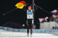 <p>Laura Dahlmeier, of Germany, crosses the finish line to win the gold medal in the women’s 10-kilometer biathlon pursuit at the 2018 Winter Olympics in Pyeongchang, South Korea, Monday, Feb. 12, 2018. (AP Photo/Andrew Medichini) </p>