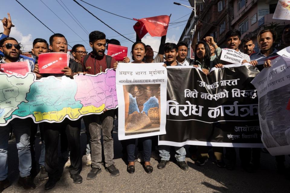 A group of students on 31 May burned a copy of an outdated map of India, which included Nepali territory as part of ‘Akhand Bharat’ (undivided India), similar to the one appearing inside the recently inaugurated new parliament building of India (EPA)