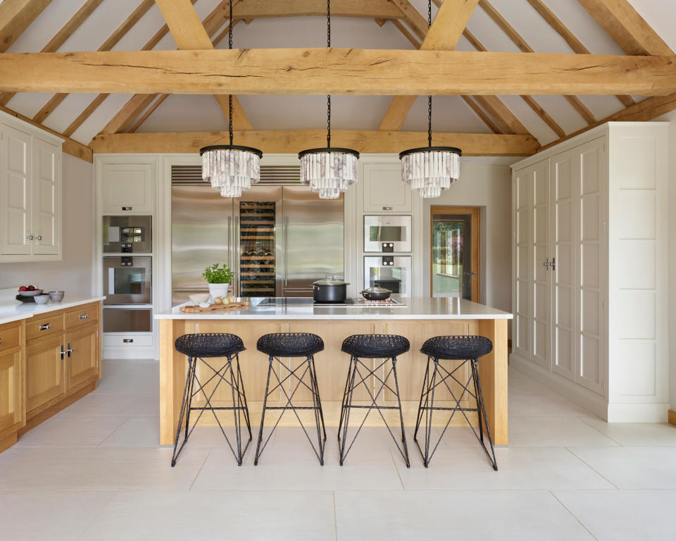 <p> Whether a traditional feature such as a beamed, vaulted ceiling in your kitchen is original or as part of a new kitchen extension idea designed in the country style, using a mix of wooden and painted cabinetry will help to complement the warmth of the timber.  </p>