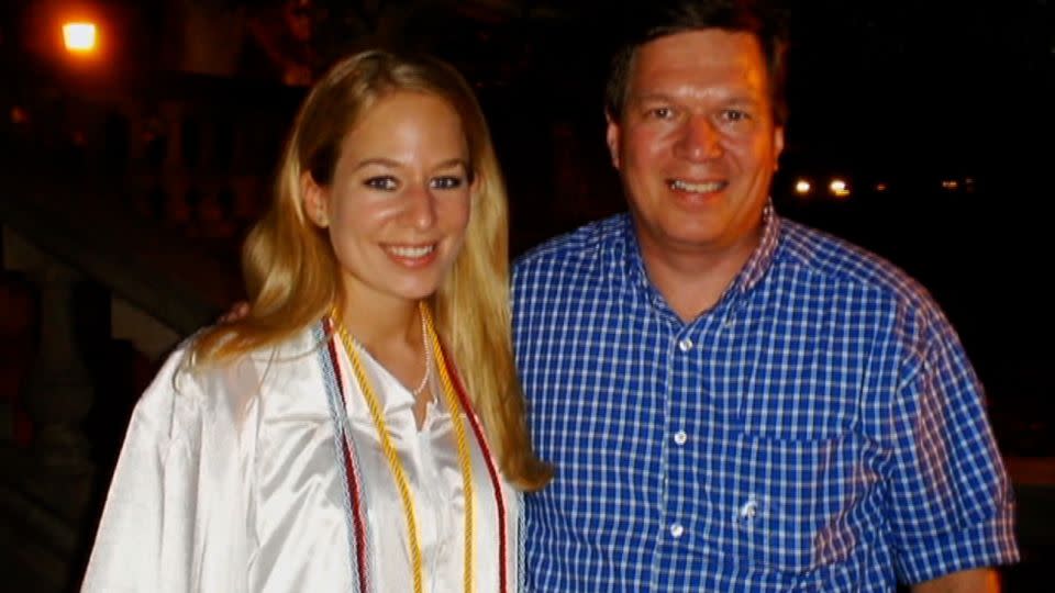 Natalee Holloway stands with her father Dave Holloway on her graduation day from Mountain Brook High School in Mountain Brook, Alabama, in 2005. - Natalee Holloway Family