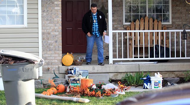 Pleasant Grove Police investigate the scene where seven infant bodies were discovered and packaged in separate containers at a home in Pleasant Grove, Utah. Photo: AP.