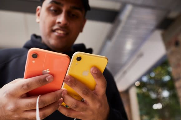 Man testing out iPhone XR at an Apple Store