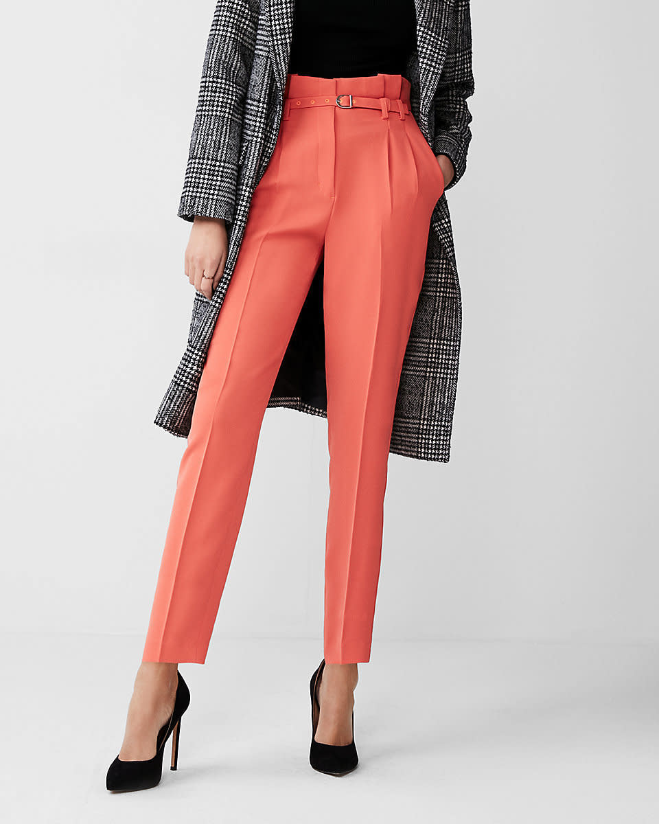 Get them at <a href="https://www.express.com/clothing/women/high-waisted-belted-sash-waist-ankle-pant/pro/07459702/color/ORANGE" target="_blank">Express</a>, $70.