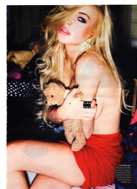 Lindsay Lohan grasps a stuffed being to her naked dÃ©colletÃ©: "Warm my cold heart, lil' Teddy."