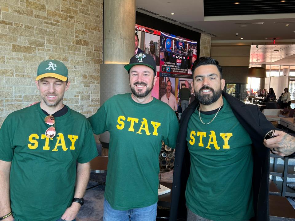 Oakland Athletics fans Jared Isham, Gabriel Cullen and Jorge Leon at the MLB Owners Meetings in Arlington, Texas.