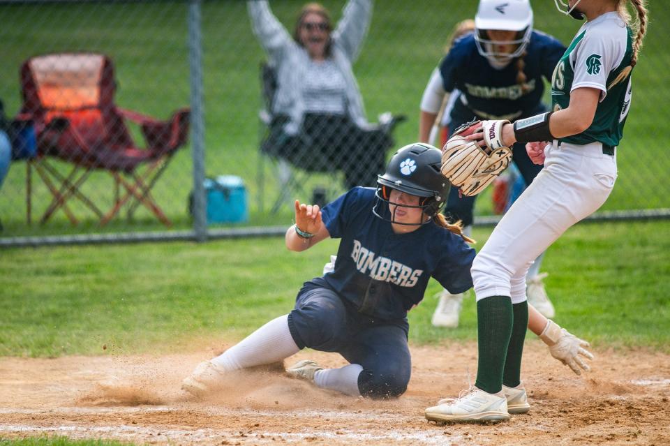 Pine Plains' Peyton Burton slides home safely for the winning run as Pine Plains rallies for a 10-9 win over Spackenkill in the MHAL semifinal on May 13, 2024.