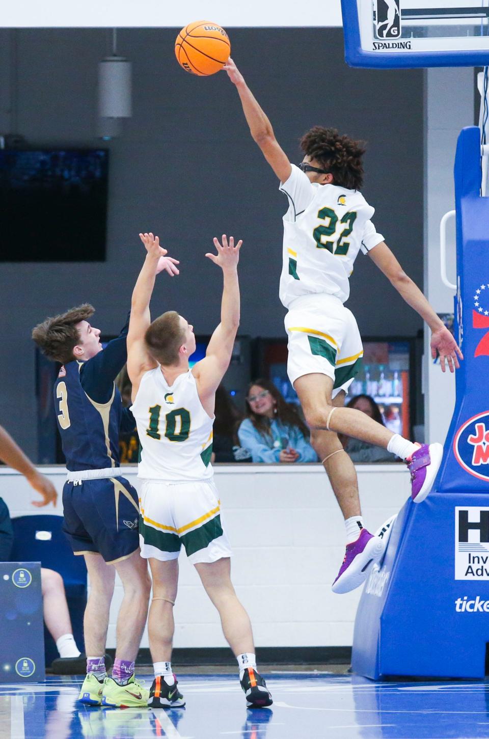 St. Mark's Jorden Jones leaps for a block against Delaware Military's Gabriel Swift (3) in the second half of St. Mark's 59-50 win in the Fifth Annual SL24 Memorial Classic, Friday, Feb. 3, 2023 at the Chase Fieldhouse. The seven-game, two-day fundraiser for the SL24: UnLocke the Light foundation continues Saturday.