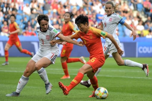 China and Spain played out a 0-0 draw in Le Havre which took both sides through to the last 16 of the World Cup